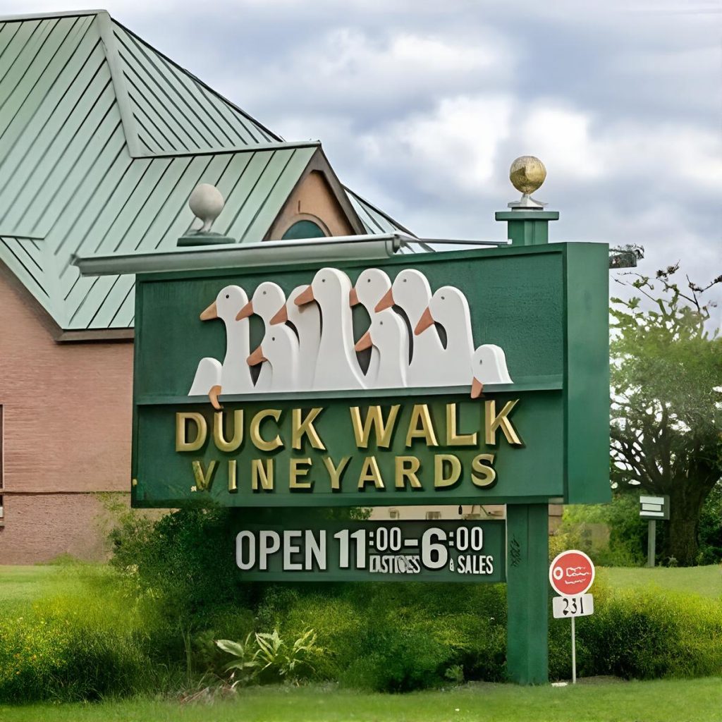 Entrance sign for Duck Walk Vineyard on Long Island during a Long Island wine tour.